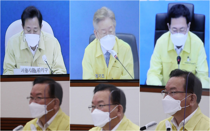 오세훈 서울시장(왼쪽부터)과 이재명 경기지사, 박남춘 인천시장이 29일 정부서울청사에서 열린 코로나19 대응 중앙재난안전대책본부(중대본) 회의에서 발언하고 있다. (사진=연합뉴스)