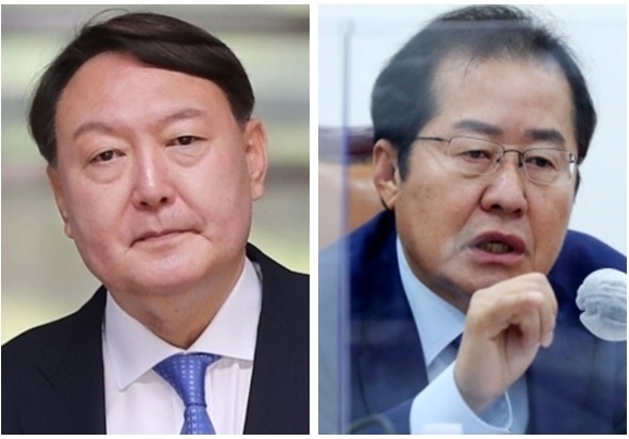 국민의힘 대선 후보인 윤석열 전 검찰총장과 홍준표 의원 