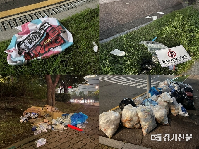 24일 저녁 수원 월드컵경기장 인근 공원과 보행로에 버려진 마스크, 우비, 물병, 현수막 등. (사진=강현수 기자)