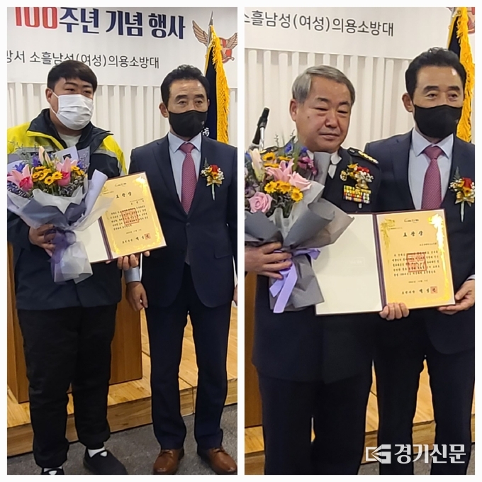포천시장 표창을 받은 대원과 단체 표창을 받은 소흘읍의용소방대의 대표로 김종대 남성대장이 백영현 포천시장과 기념촬영하고 있다. (사진=문석완 기자)