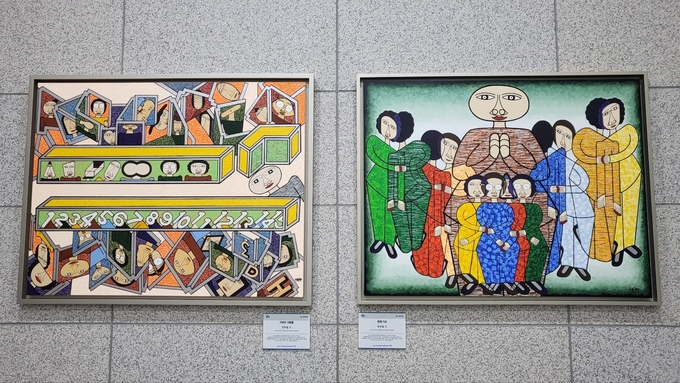 경기도청 신청사 내 지하 1층에 걸린 한부열 작가의 작품 ‘함께 가요’와 ‘아파트 사람들’ (사진=김혜진 기자) 