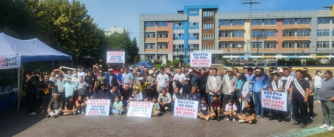 병점초등학교 이전 반대 규탄대회 모습. (사진=임채덕 의원 제공)