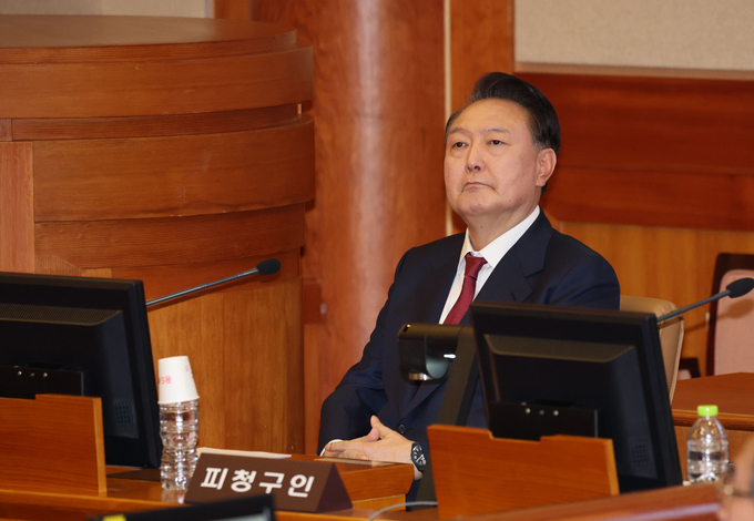 윤석열 대통령이 지난 23일 오후 서울 종로구 헌법재판소 대심판정에서 열린 탄핵심판 4차 변론기일에 출석해 있다. (사진=사진공동취재단)